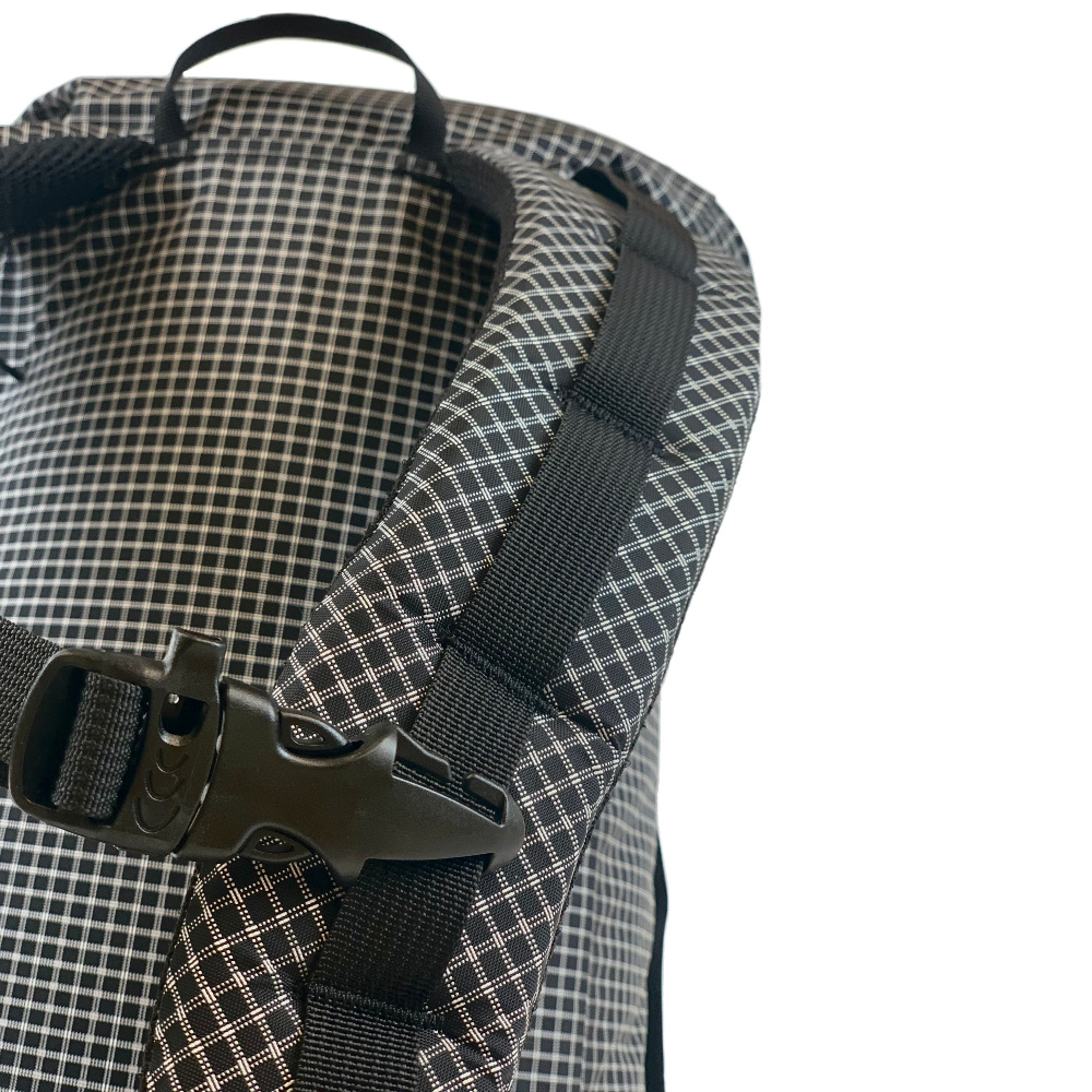 The daisy chain detail on the MLD Core pack shoulder straps.