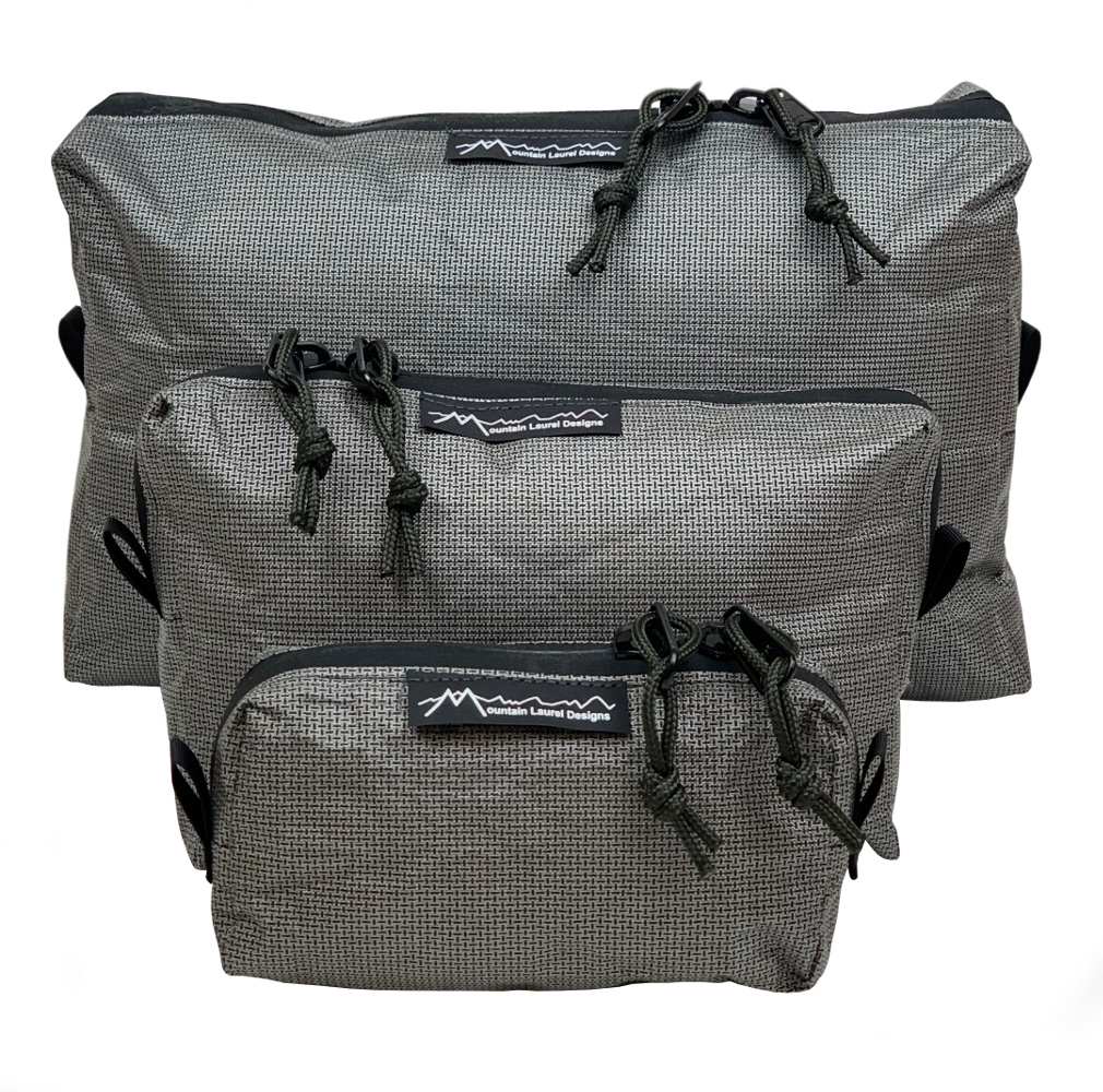 A front view of the MLD UltraX 100 Packing Cubes: Small, Medium, and Large.
