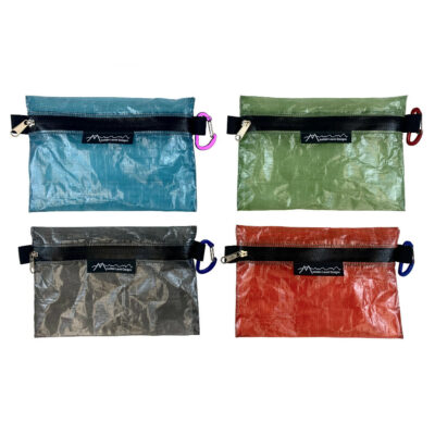 Four MLD DCF Zip Pouches showing the colors: Blue, Green, Dark Grey, and Red.