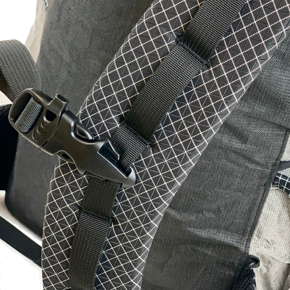 The sternum strap and shoulder strap daisy chain on the MLD Exodus Ultra. The sternum strap has a built-in whistle.