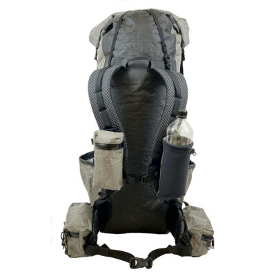 A front view of the MLD Shoulder Pockets on a backpack. The zippered pocket is on the left and the water bottle holder is on the right. They connect to the strap's daisy chains.