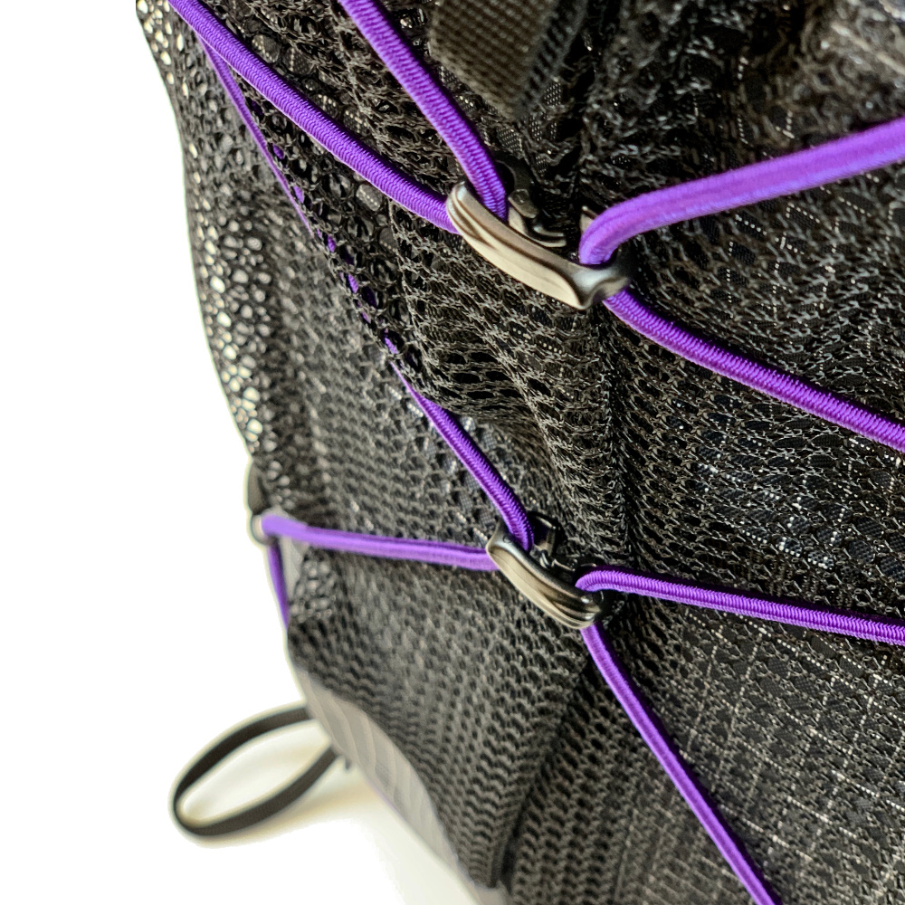 A Close Up of the Connector Sliders on a purple bungee cord on an MLD pack