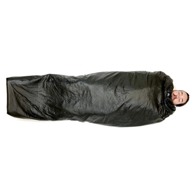 A top view of a man sleeping in a Vision Quilt.