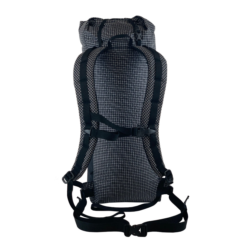 A back view of the MLD Hell pack showing the shoulder straps and webbing buckle