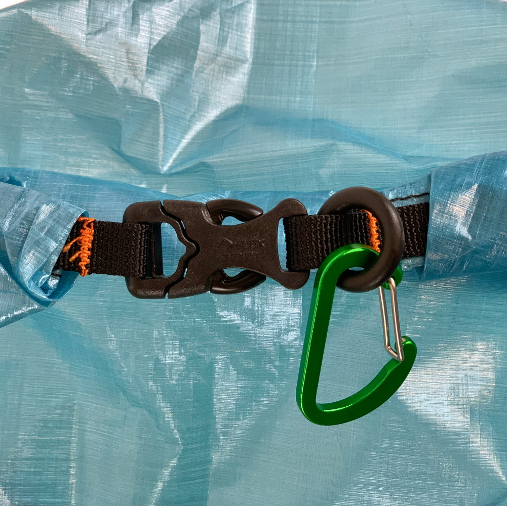 The DCF Food Bag Closure detail showing the rolltop, buckle and caribiner on plastic o-ring.