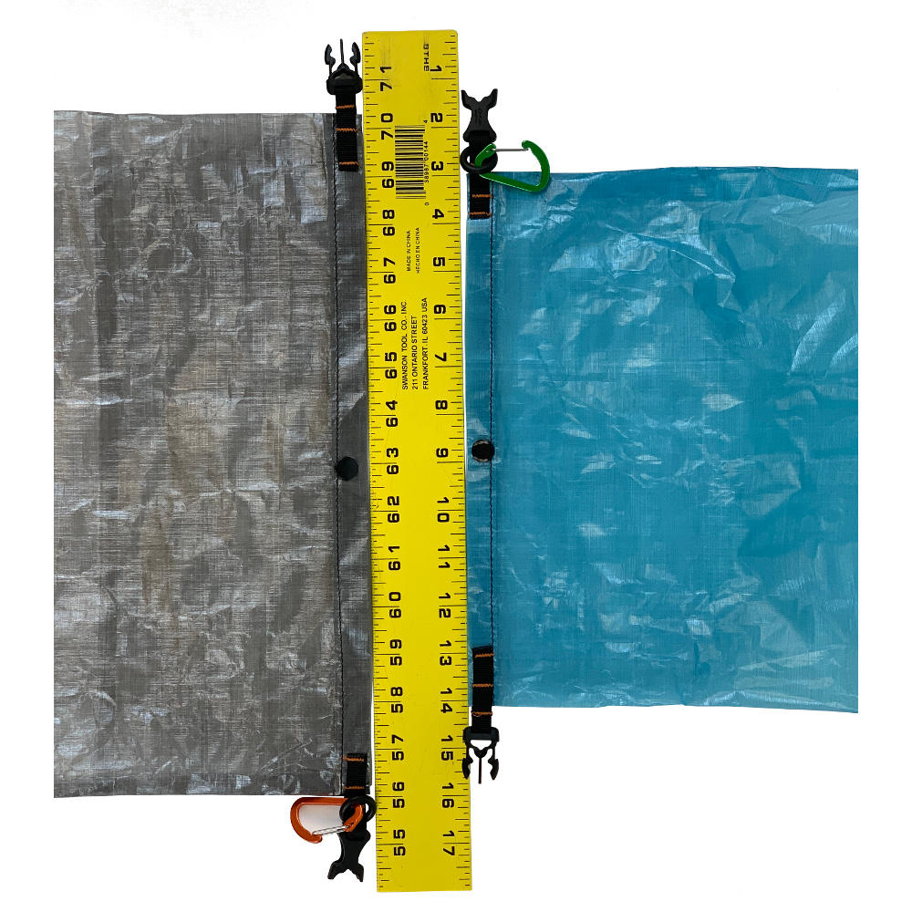 An image of the DCF Food Bags laying flat with the roll tops next to a ruler. The large bag, on the left, shows it is approx. 15" wide. The small bag, on the right, shows it is approx. 12" wide.