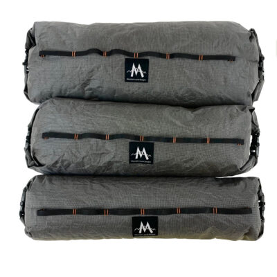 Ultra X Double End Handlebar Dry Bags for bikepacking, bike racing, and ultra bike adventures. Image shows three sizes next to each other