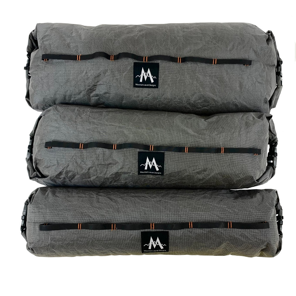 Ultra X Double End Handlebar Dry Bags for bikepacking, bike racing, and ultra bike adventures. Image shows three sizes next to each other
